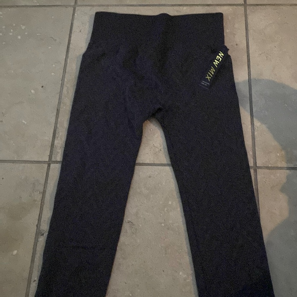 New Mix leggings. Brand new with tags size L/XL